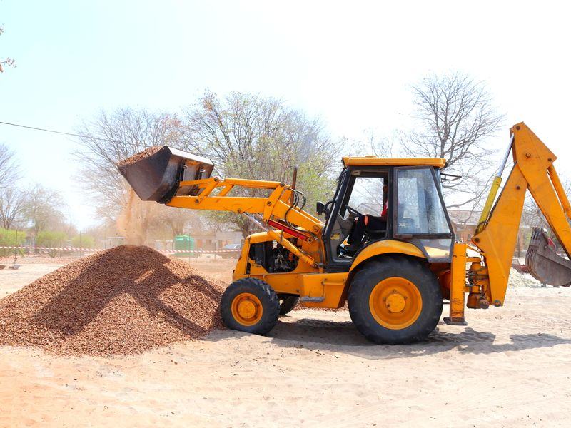 Excavator digging a house foundation in Wakefield, Rhode Island